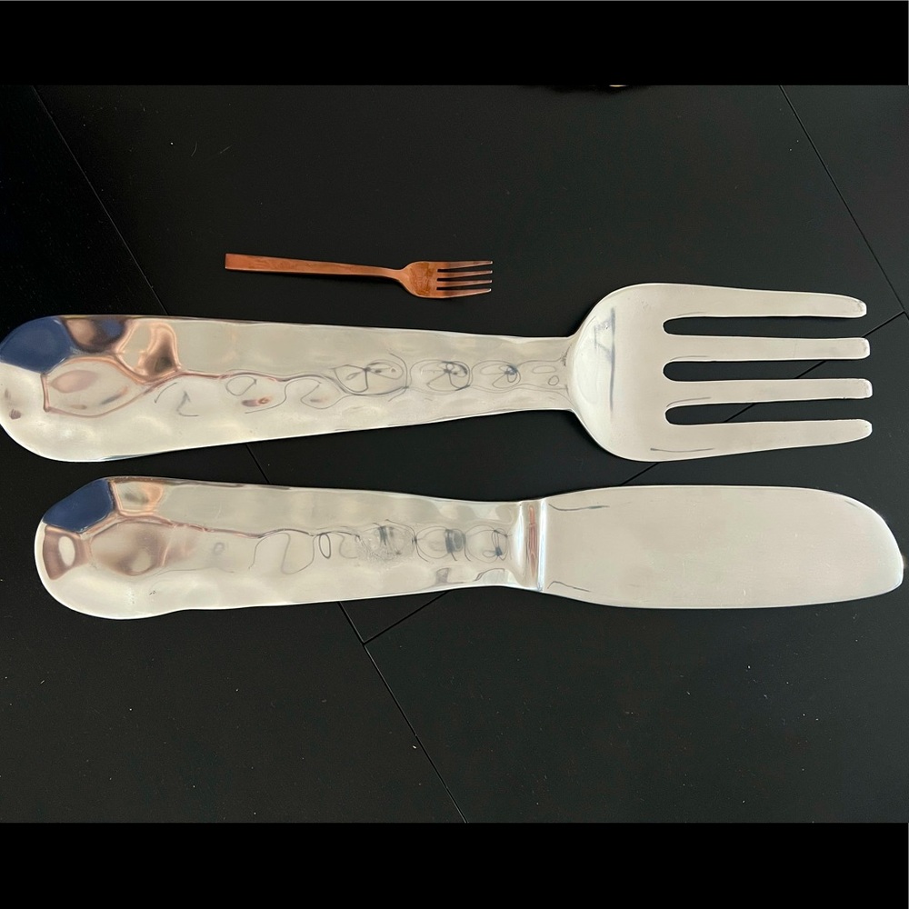 Large metal fork and knife. Light unique pieces. Wall hangings